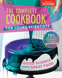 A book cover with a photo of a cake being coated with a purple and green ganache