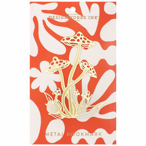 gold metal brass bookmark shaped like a mushroom on an abstract orange and white background gold metal brass bookmark shaped like a mushroom on an abstract orange and white background