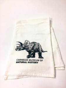 100% cotton tea towel with triceratops and CMNH logo imprinted in black. 100% cotton tea towel with triceratops and CMNH logo imprinted in black.