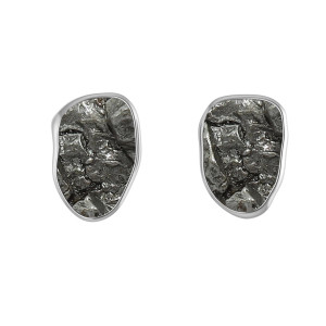 A pair of stud earrings featuring meteorites set in sterling silver