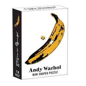 A small black and white box with a banana on the front. A small black and white box with a banana on the front.