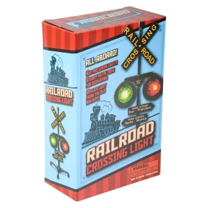 A blue box containing a red and green railroad crossing lamp