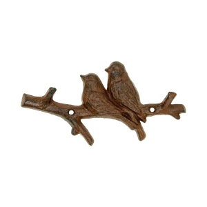 This image shows the key holder. It is made of metal, with raised details. Two songbirds sit next to each other, perched on a branch.