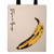 A cream colored canvas tote bag with black handles silkscreened with the image of banana in yellow and black. A cream colored canvas tote bag with black handles silkscreened with the image of banana in yellow and black.