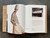 An open book with a model in Halston clothes