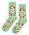 Mint green crew socks decorated with multiple Frida Kahlo heads.