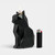 Black cat shaped candle with black lighter.