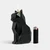 Black cat shaped candle with black lighter.