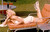 Two page color photo of Marilyn Monroe lounging. Two page color photo of Marilyn Monroe lounging.