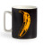 Yellow banana on a black background shown on mug. Yellow banana on a black background shown on mug.