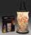 fully expanded lantern next to outer packaging. lantern has a variety of wildflowers printed on it.