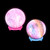 Two spheres, one mostly pink sphere with colors and clouds on a pink stand and one multicolored on a blue stand, glowing as lamps