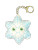 A plush keychain in the shape of a snowflake with a face on the side