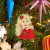 Dolly Enamel Ornament On Tree