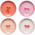 Plates featuring painting of a bow in colors Red, Pink, Blush, and White.