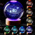 A crystal sphere lamp with the solar system engraved in the interior on a wooden USB powered base shown in various color modes