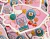 90's Kid Matte Vinyl Sticker with trinkets in pink hand
