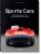 A black book cover with a red sports car
