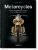 A black book cover with a copper colored motocycle