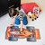 A child assembling a race car floor puzzle