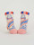 Pair of baby socks, cream colored background, blue and salmon color