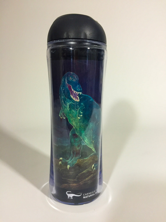 14 oz. tumbler with Tyrannosaurs Rex vintage image by Ottmar Von Fuehrer, 1950 with the CMNH logo at the bottom of the tumbler in white.