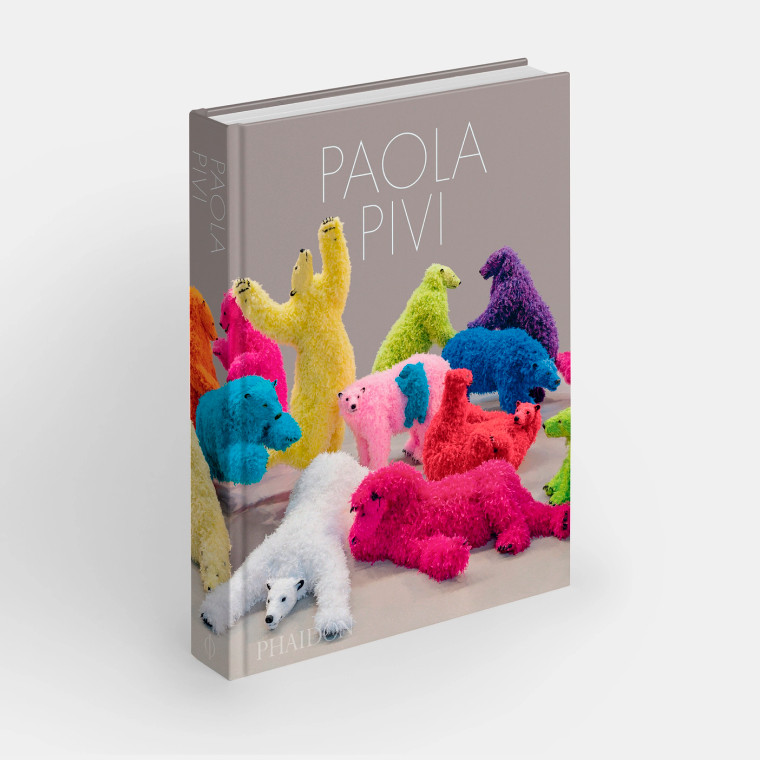 A book with text "Paola Pivi" above a group of brightly colored polar bears