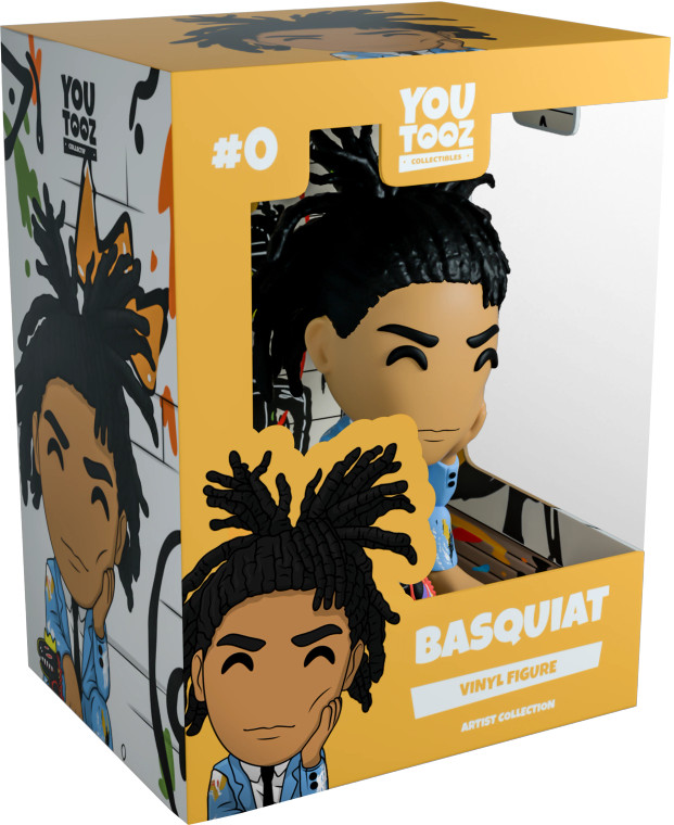 A vinyl figure of Basquiat inside of its packaging.