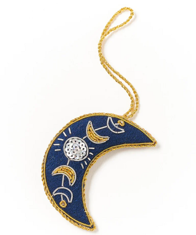 blue crescent moon, embellished with gold and silver embroidery