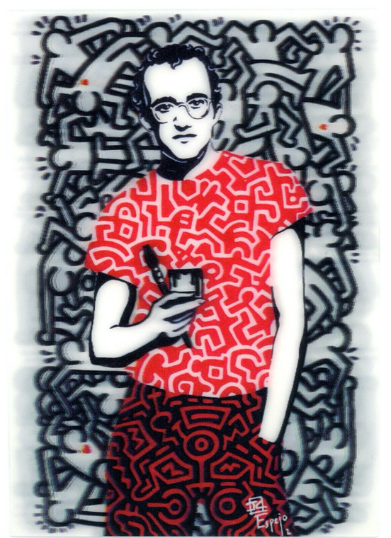 a lenticular postcard of Keith Haring holding paintbrush, and b & w background.