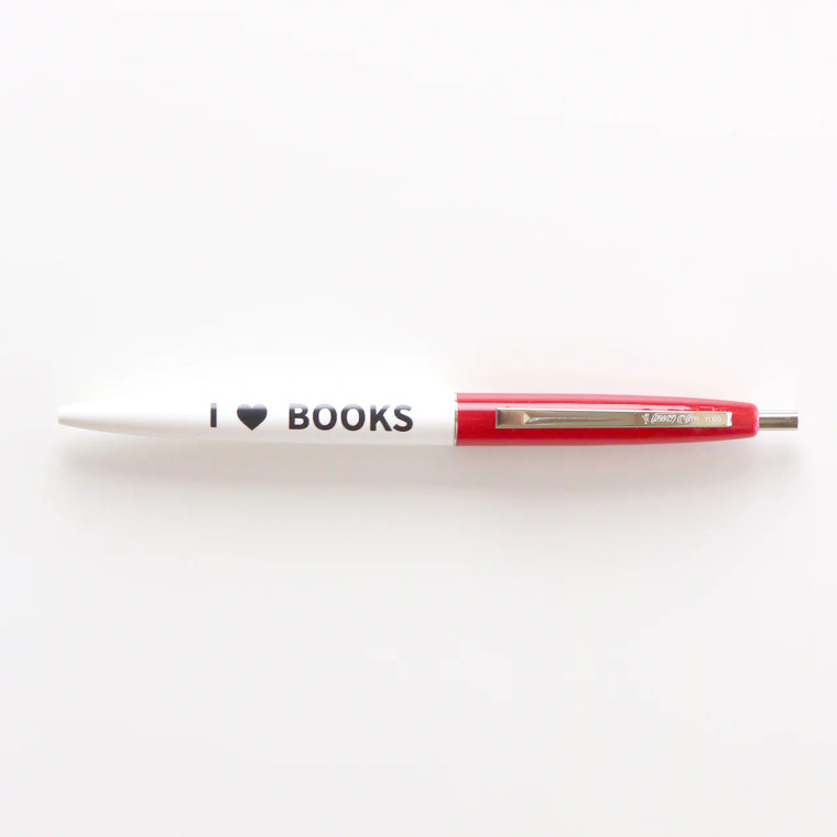 Red and white click pen, text: "I heart books".