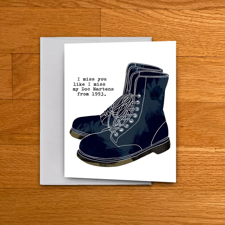 Notecard with an illustration of a black combat boot.