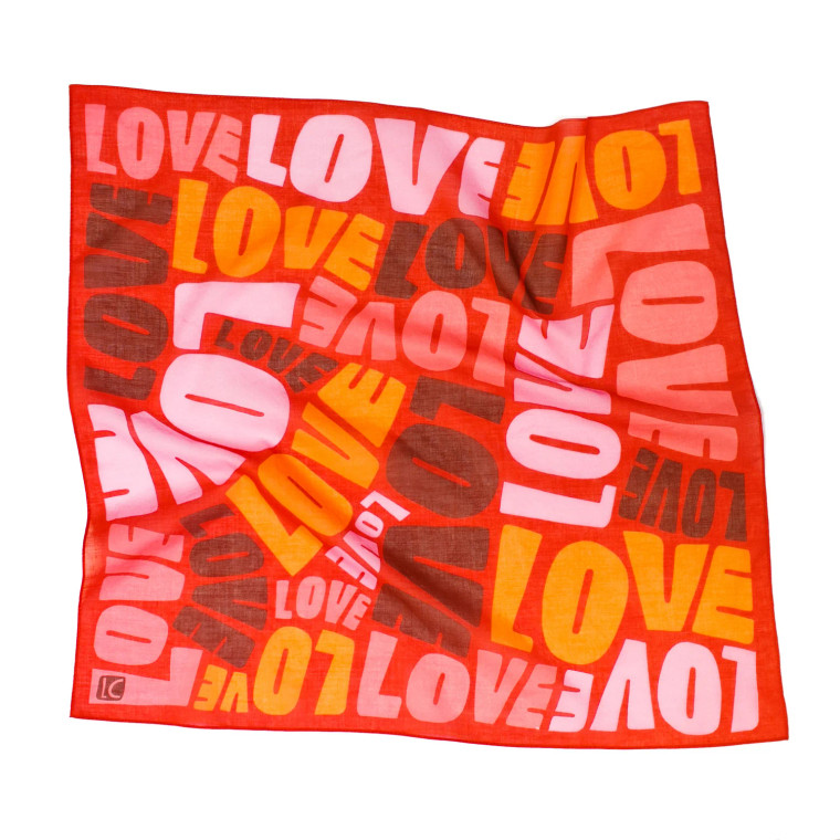 Open scarf showing the pattern text.
text: Love