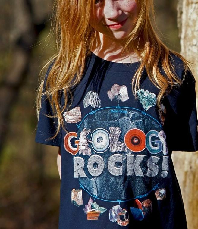 Geology Rocks is printed on the t-shirt with minerals surrounding the words. It also shows the hardness of each mineral using the Mohs Scale. 100% Cotton