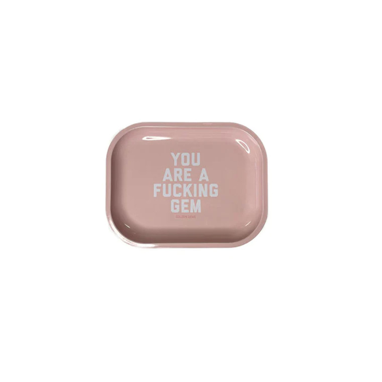 Light pink tray, white text " you are a fucking gem".