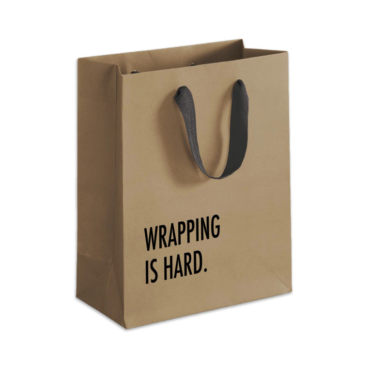 Kraft bag with black handles, text: wrapping is hard.