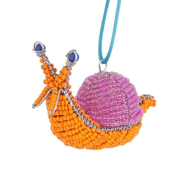 beaded snail ornament with pink shell