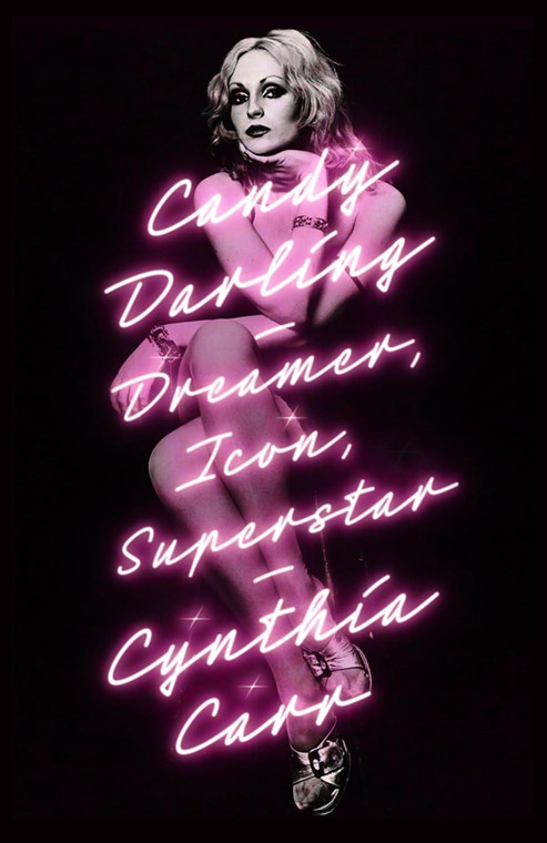 Black book cover, photo of Candy Darling in the center, inlaid with title of book in pink neon text. title text: Candy Darling, Dreamer, Icon, Superstar