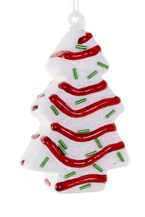 White Christmas tree shaped cake ornament.