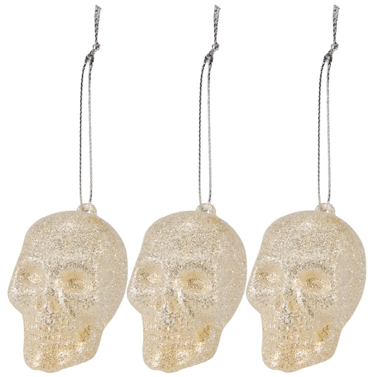 Set of 3 glitter covered skull head ornaments.