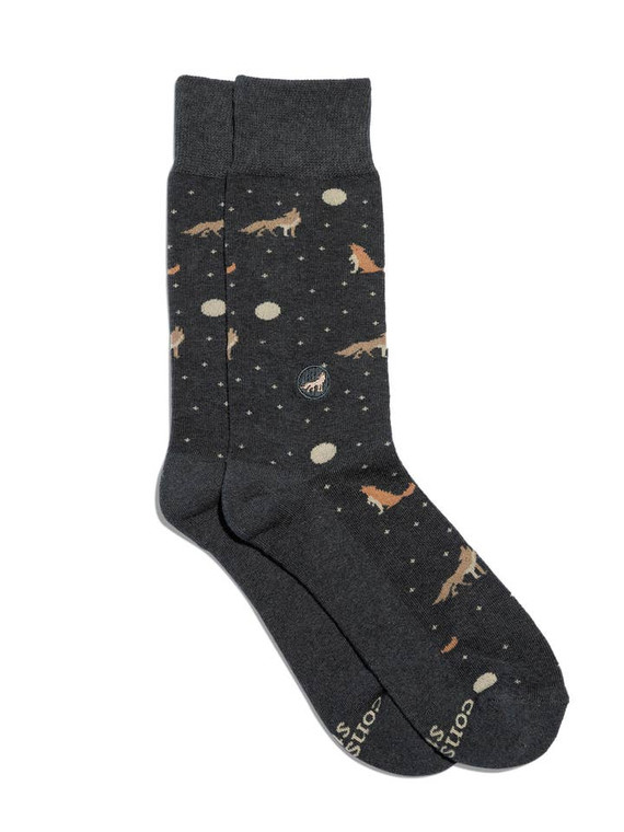 navy blue sock with wolves and moons printed on it