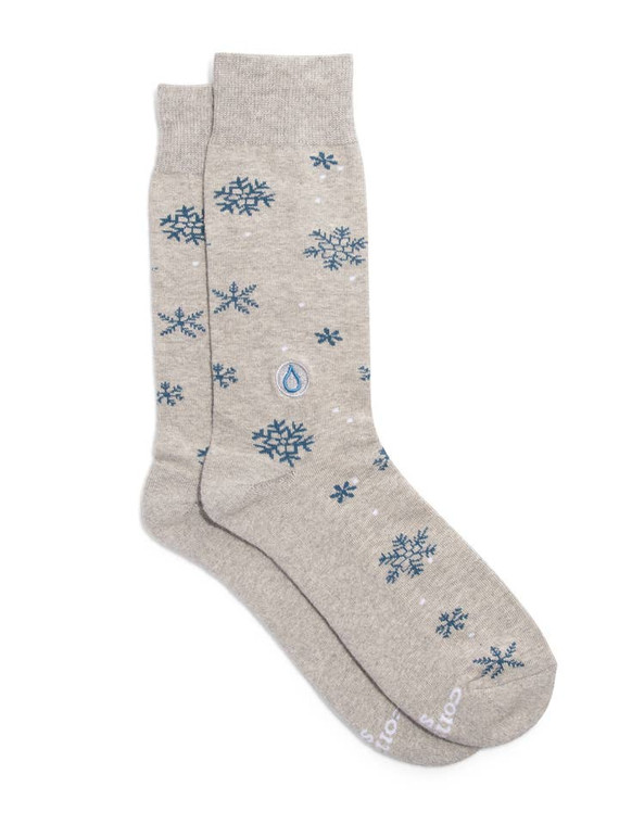 gray sock with white and blue snow flakes printed on it