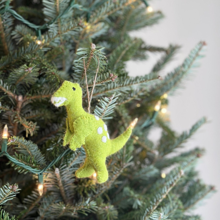 green felt t. rex with white teeth and spots