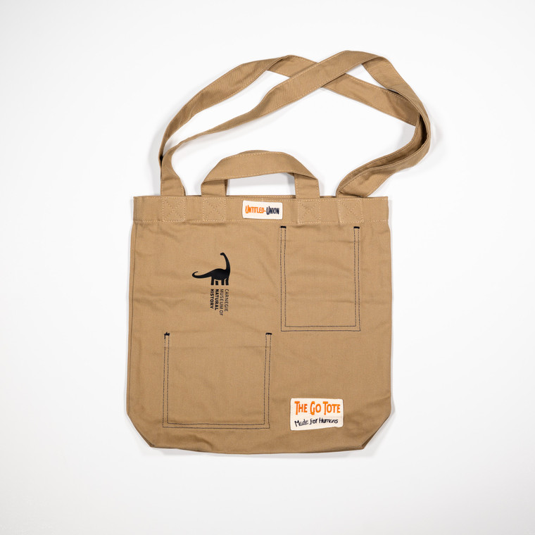 tote bag with both sizes of handles laid flat, CMNH logo is in upper left corner