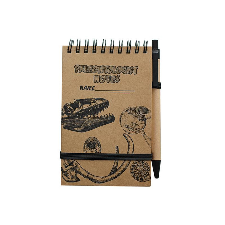 small brown notebook with images of dino fossils printed on front, sprial bound along the top with attached pen and band across bottom