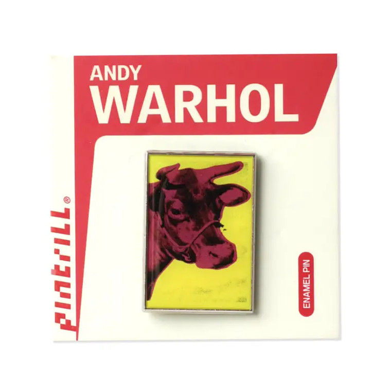 Enamel pin of Warhol's yellow and pink cow art work.