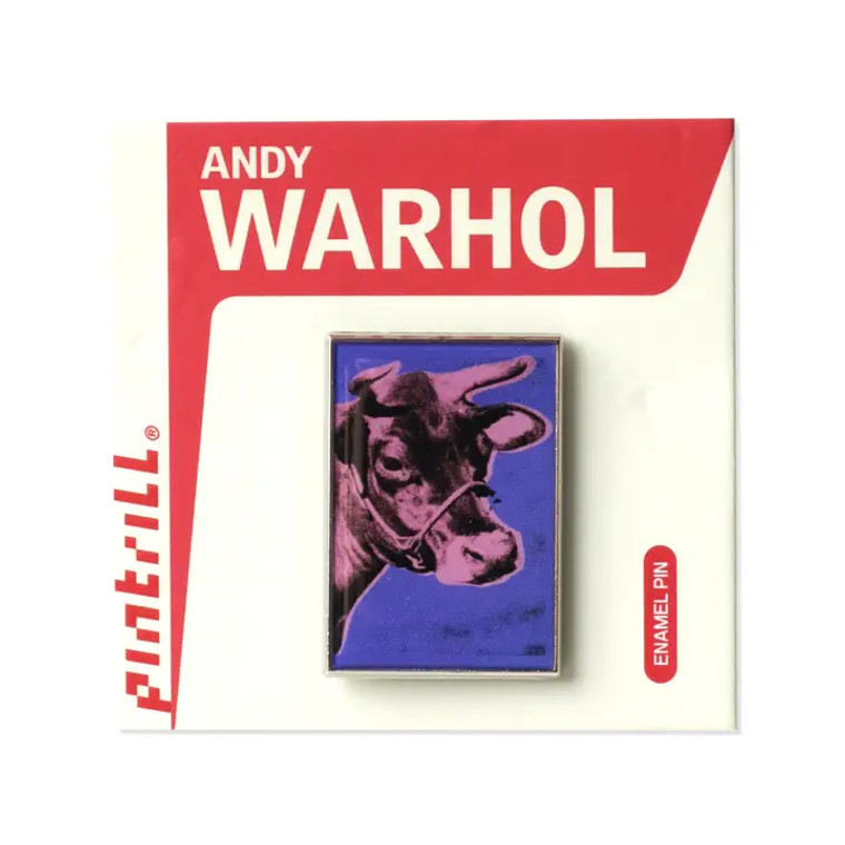 Enamel pin of Warhol's pink and purple cow art work.