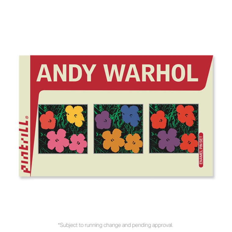 The three pin set of Warhol's flowers placed on the packaging.