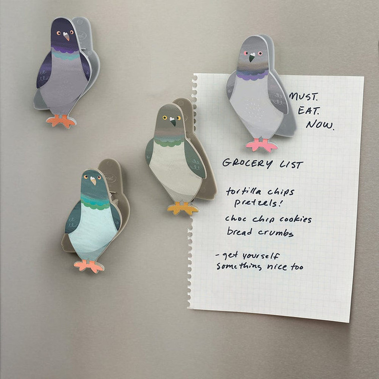 multiple pigeon clips used as magnets on a fridge