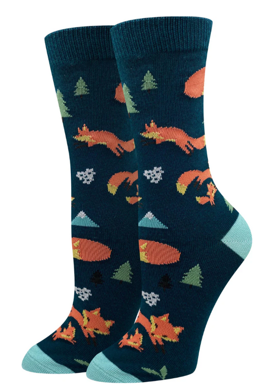 socks, dark teal with light blue toe and heel, small red foxes, trees and mountains are printed on it.